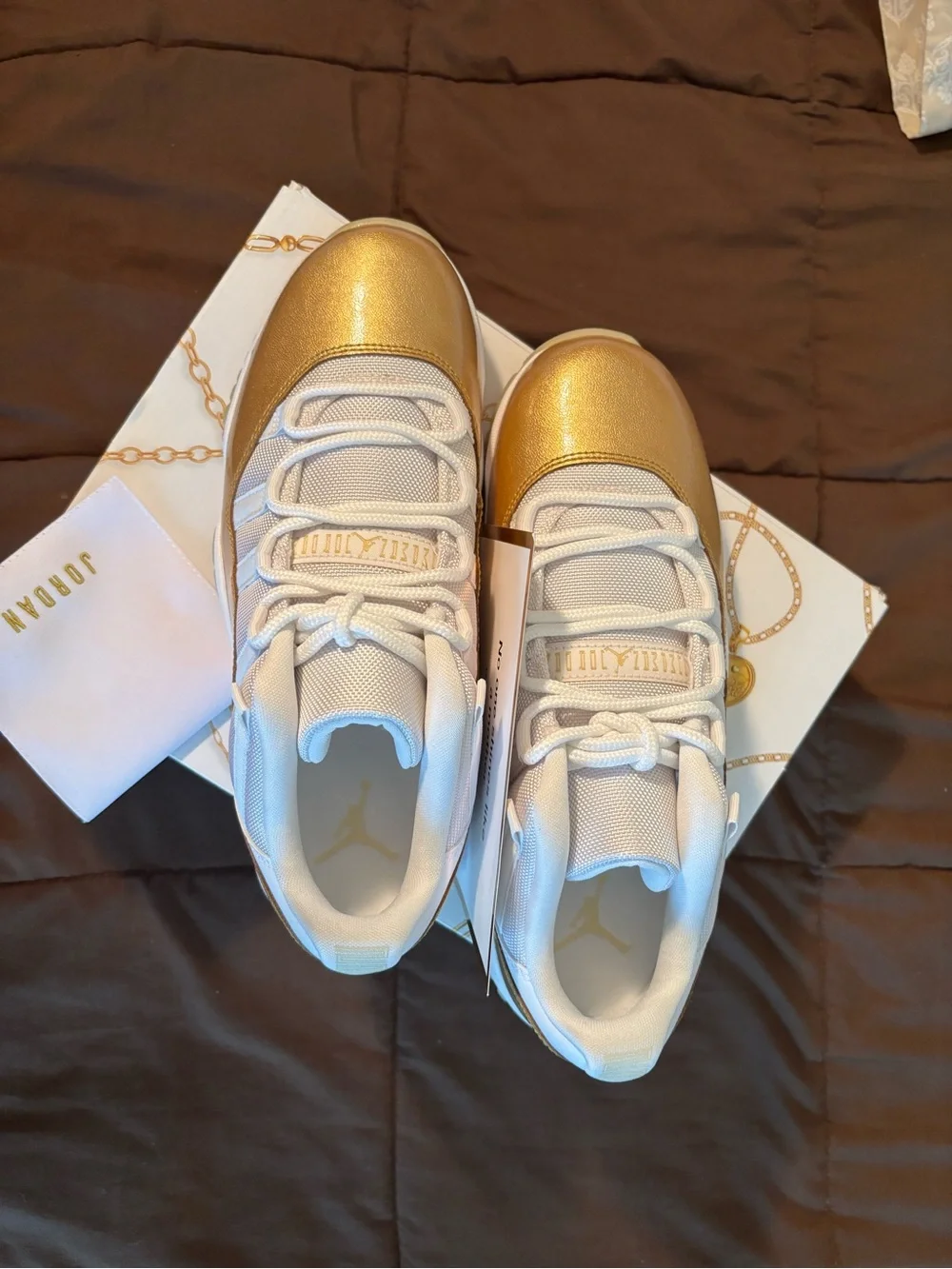Jordan Low Top Sneakers in White and Gold Metallic
